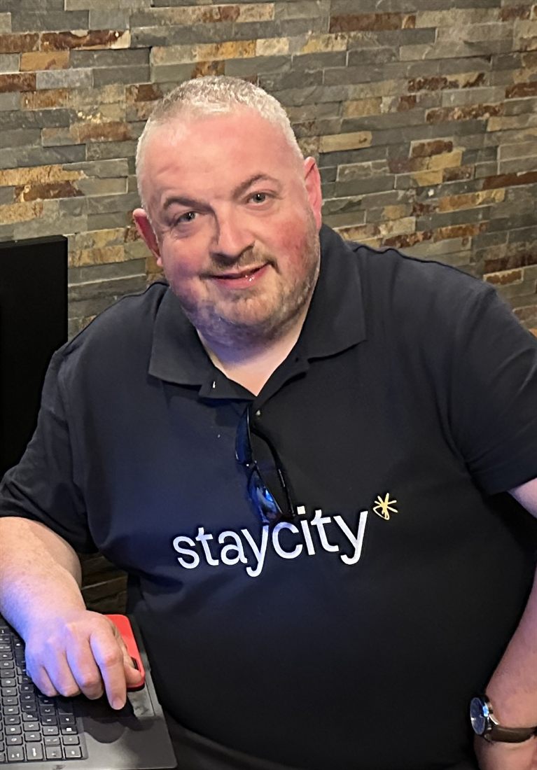 Keith Freeman wearing a Staycity shirt
