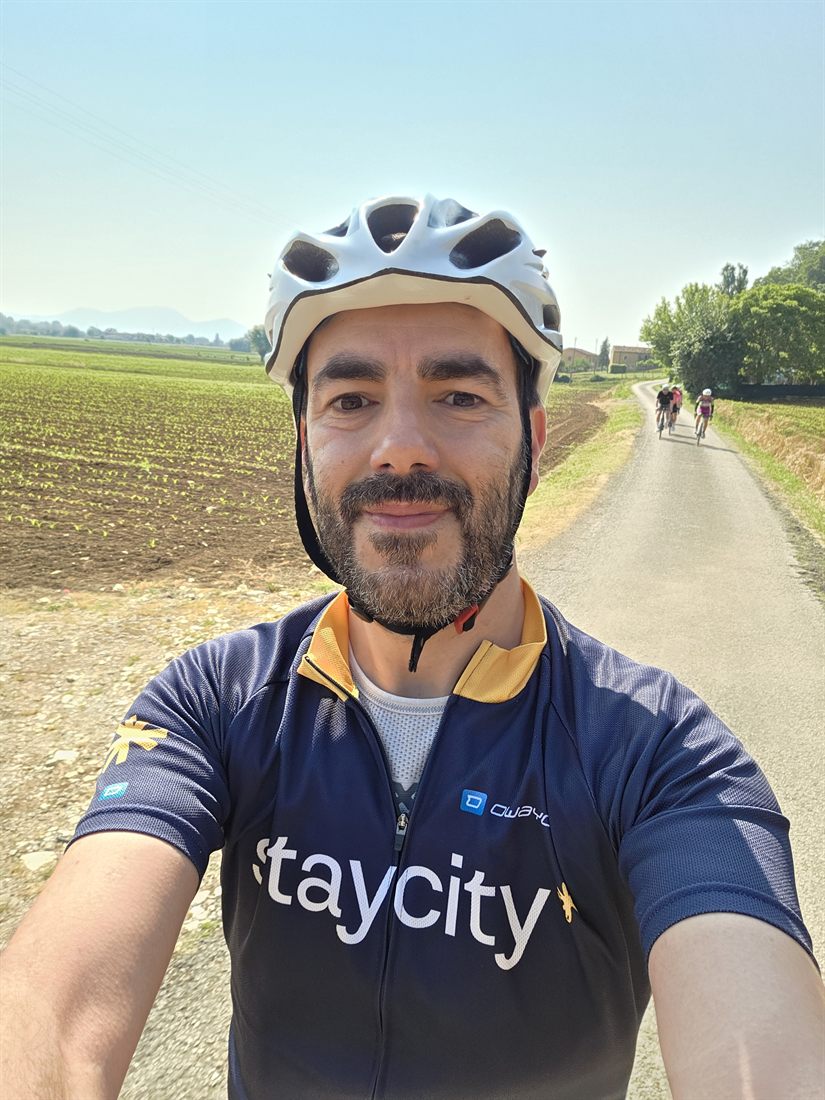 Paolo Don&agrave; cycling in Staycity kit during a training ride